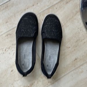 Clarks shoe that are black with sparkles.